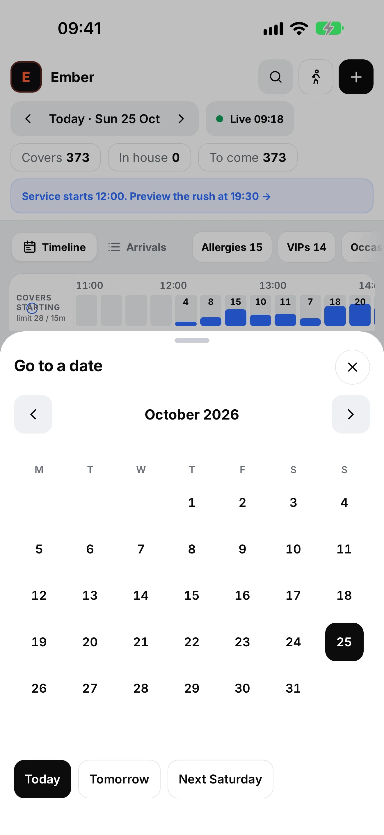 The host stand on iPhone with the date sheet open: a calendar for October 2026 with today, Sunday the 25th, selected, and shortcuts for Today, Tomorrow and Next Saturday.